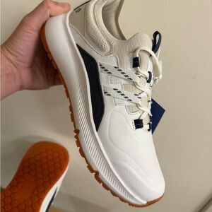 White and Navy woman’s Athletic Shoes
